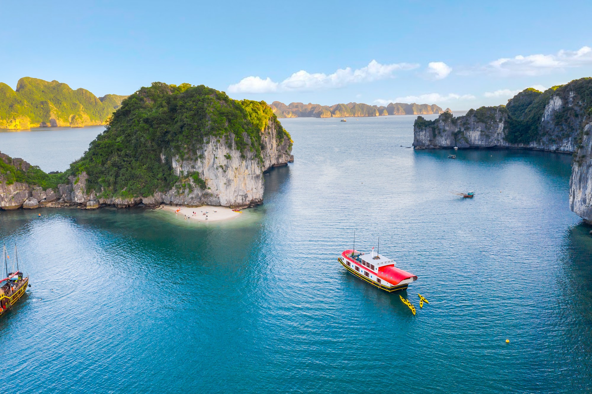 Aerial view of turquoise Lan Ha Bay with limestone karst islands, Cat Ba Island Vietnam