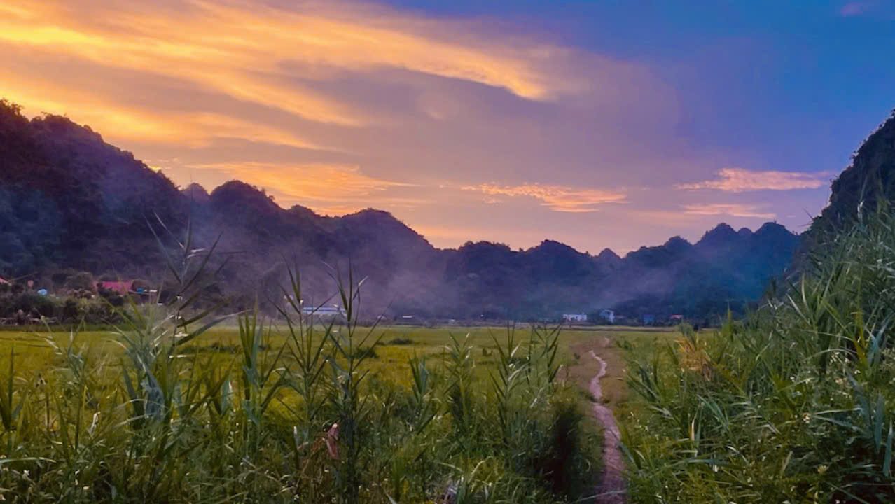 Pink sunset over the Viet Hai valley, Cat Ba Island