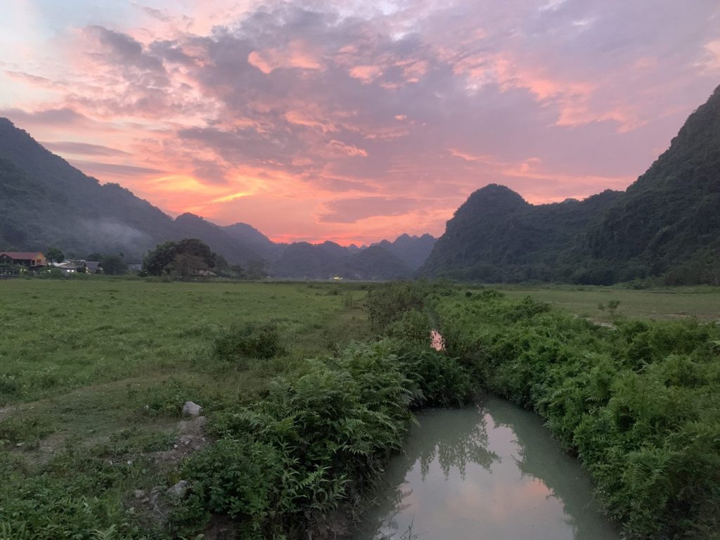 Fields and a pond in the Viet Hai valley at dusk, Cat Ba Island